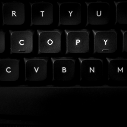 A keyboard with the word 